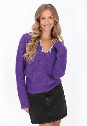 - Sweter