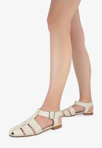 tuiggi Milano Sandaalid - beige