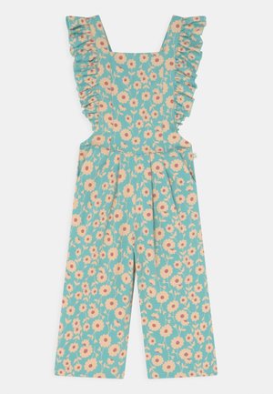 Blomstrede overalls med flæser på stropperne; levende turkis baggrund med lyserøde blomster; vidde ben design; letvægtsstof; rynket talje.