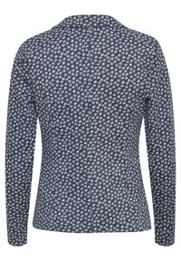 Chemise bleu marine à manches longues avec petit motif floral blanc, coupe cintrée, vue de dos avec col.