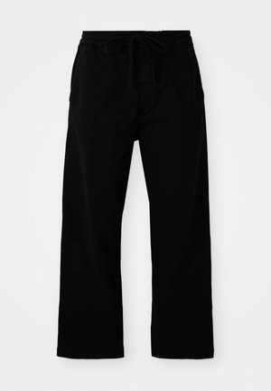 Black, elastic-waist pants with adjustable drawstring, wide legs, and a smooth cotton texture. No visible patterns or hardware details.