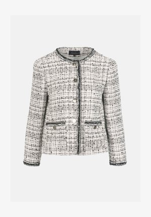 Chaqueta de tweed blanca y negra con cuello redondo, cinco botones y dos bolsillos frontales. Presenta ribetes contrastantes y tejido texturizado.