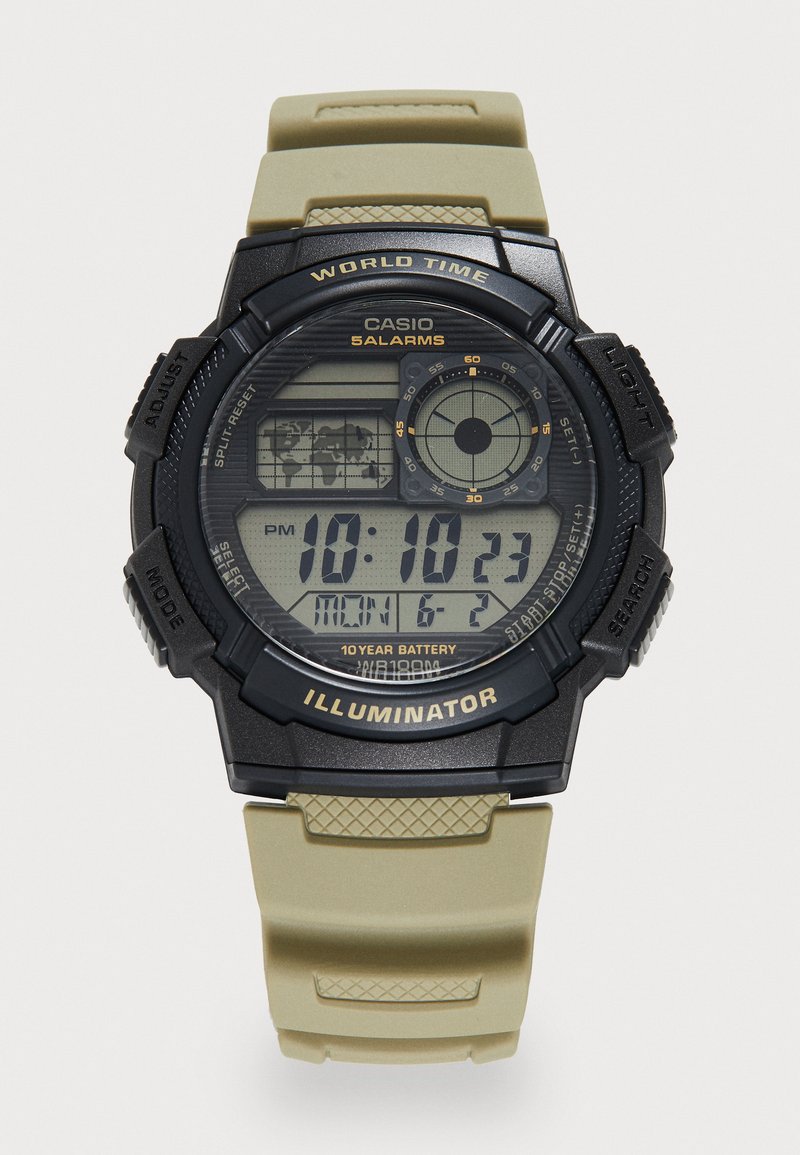 Montre numérique avec un boîtier noir et un bracelet en silicone beige. Les caractéristiques incluent un écran LCD, l'heure, la date et des fonctions d'alarme, ainsi que des boutons texturés.
