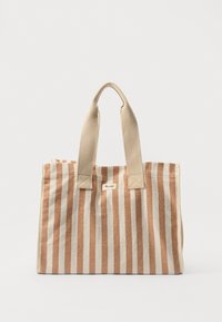 Tote-Bag aus Segeltuch mit senkrechten Streifen in Beige und Rost, ausgestattet mit kurzen, robusten Griffen und einem kleinen Markenetikett auf der Vorderseite.