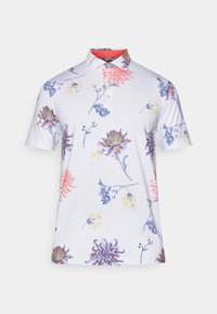 Hvit kortermet polo skjorte med flerfargede blomsterdesign. Detaljer inkluderer rød krage og to-knaps placket.