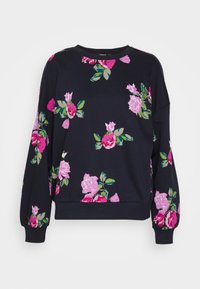 Sweat-shirt bleu marine avec imprimé floral de roses roses et violettes, manches longues, poignets et ourlet côtelés.