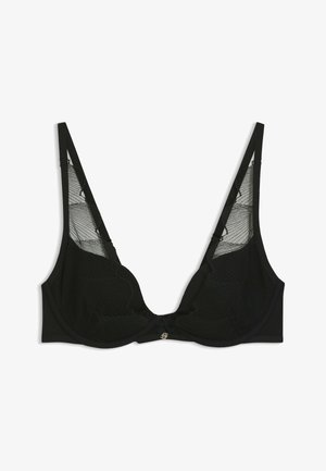 Schwarzer BH mit tiefem Ausschnitt, versehen mit transparenten Netzpaneelen mit geometrischen Mustern. Verschluss hinten und verstellbare Träger.