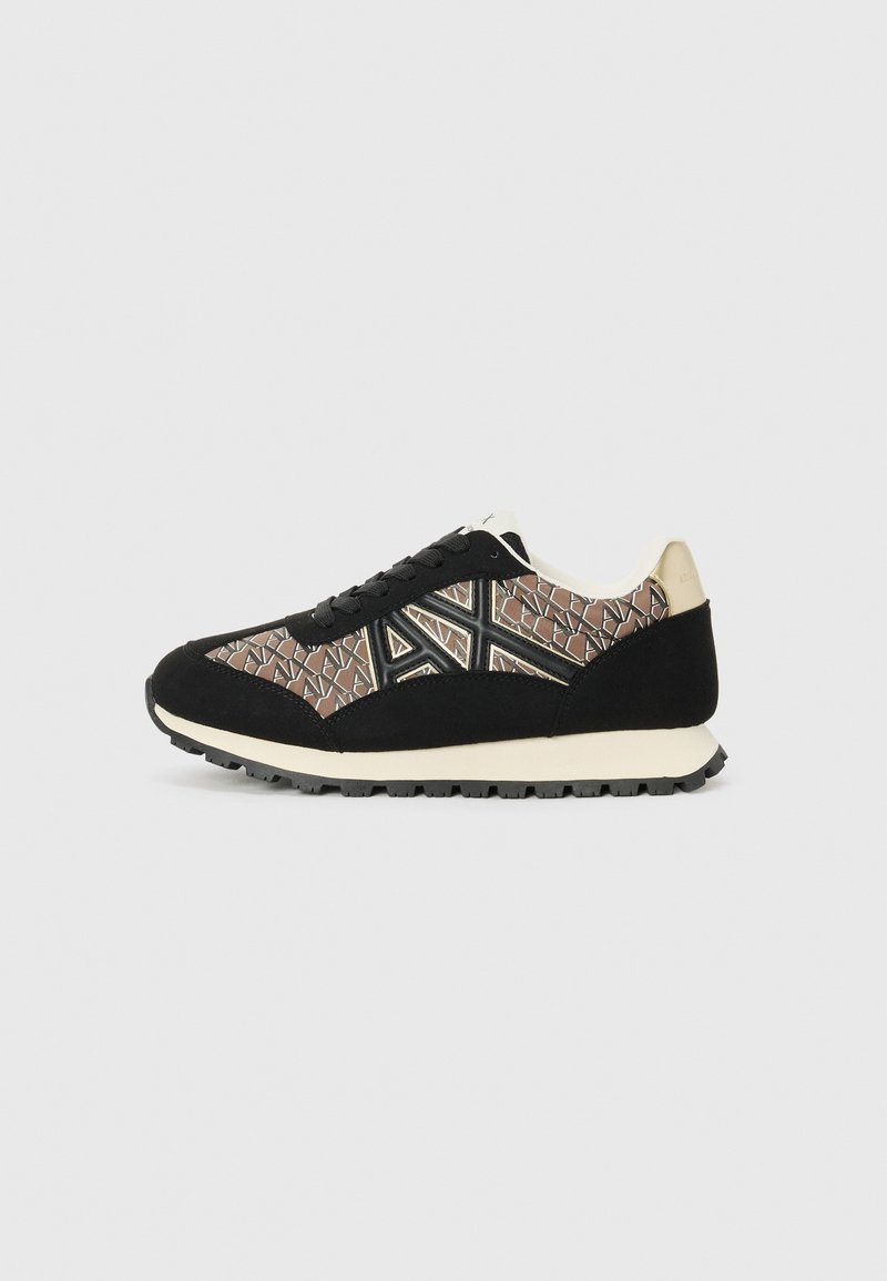 Black sneaker with a patterned brown and black mesh upper, suede detailing, white midsole, and textured black outsole.