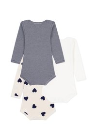 Drei Babybodysuits: einer in marineblau und weiß gestreift, einer einfarbig weiß und einer cremefarben mit navyblauen Herzmustern. Alle haben lange Ärmel und einen Druckknopfverschluss.