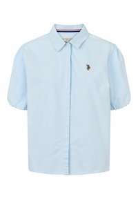 Light blue short-sleeve shirt with a collared neckline, button front, and embroidered logo detail on the left chest. Soft fabric with a smooth texture.