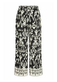 Culottes à motifs noir et blanc avec une large ceinture élastique et des détails de bordure complexes au niveau de l'ourlet. Fabriquées en tissu texturé.