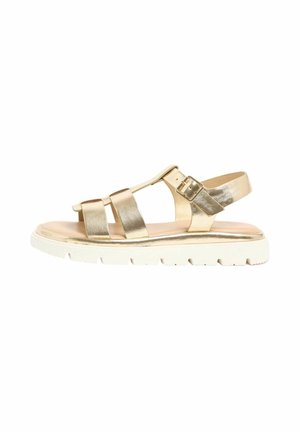 Gold metallic flat sandal with three straps, buckle closure, and white textured rubber sole on a white background.