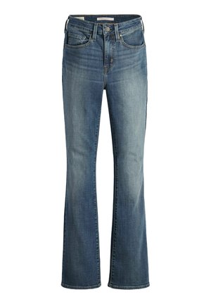 Jeans de mezclilla azules acampanados con una cintura de altura media, bolsillos frontales y detalles desgastados. La tela tiene una textura suave con sutiles acentos de costura.