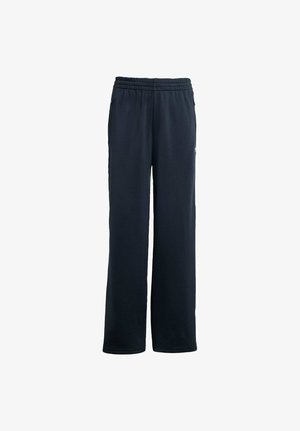 Sort løstsiddende joggingbukser med elastisk talje og sidelommer vist mod en hvid baggrund.