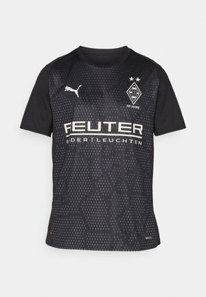 Musta urheilupaita lyhyillä hihoilla, jossa on kuusikulmainen kuvio, Puma-logo ja valkoista sponsoritekstiä. Sisältää seuran embleemin ja kaksi tähteä.