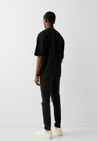 Bershka Džíny Slim Fit - black