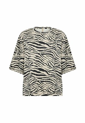 Short-sleeved, loose-fit t-shirt in beige with black zebra pattern. Features a round neckline and soft, smooth fabric texture.