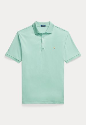 Light green short-sleeve polo shirt with three-button placket and small embroidered logo on the left chest.
