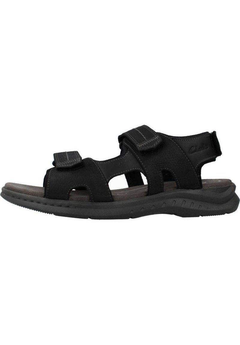 Sandalia de hombre negra con correas de Velcro ajustables, diseño de puntera abierta, suela de goma y plantilla acolchada para mayor comodidad y estabilidad.