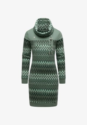 Green knitted dress with a cowl neck, featuring zigzag patterns in varying shades of green, long sleeves, and a fitted silhouette.