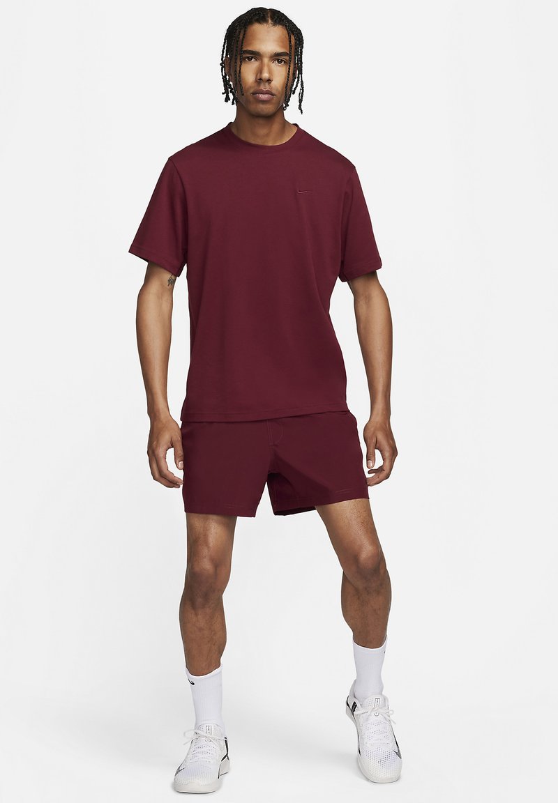 Nike Performance PRIMARY - Sport T-Shirt - dark team red dark team red