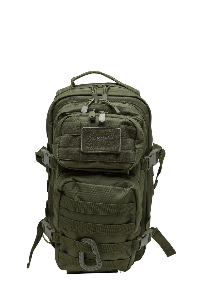Olive green tactical backpack with multiple compartments, adjustable straps, and a textured patch on the front. Features a carabiner clip.