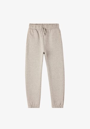 Jasnoszare spodnie dresowe z elastycznym paskiem, sznurkiem i zwężanymi nogawkami. Wykonane z miękkiego, strukturalnego materiału, z bocznymi kieszeniami.