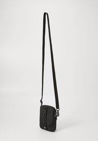 The North Face REDBOX SMALL CARRY BAG UNISEX - Axelremsväska - black