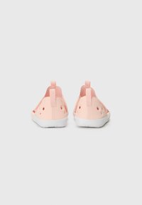 Pink rubber clogs with a textured surface, open design, and white soles. Features rear straps and ventilation holes on the sides.