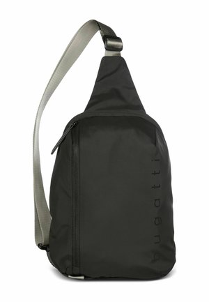 Black sling backpack with grey adjustable strap, vertical front zipper pocket, and subtle "bugatti" logo on the front.