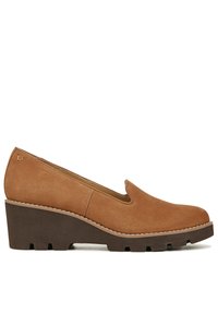 Tan suede wedge shoes with a slip-on design, featuring a textured outsole and a slight platform. Accent stitching along the sole adds detail.