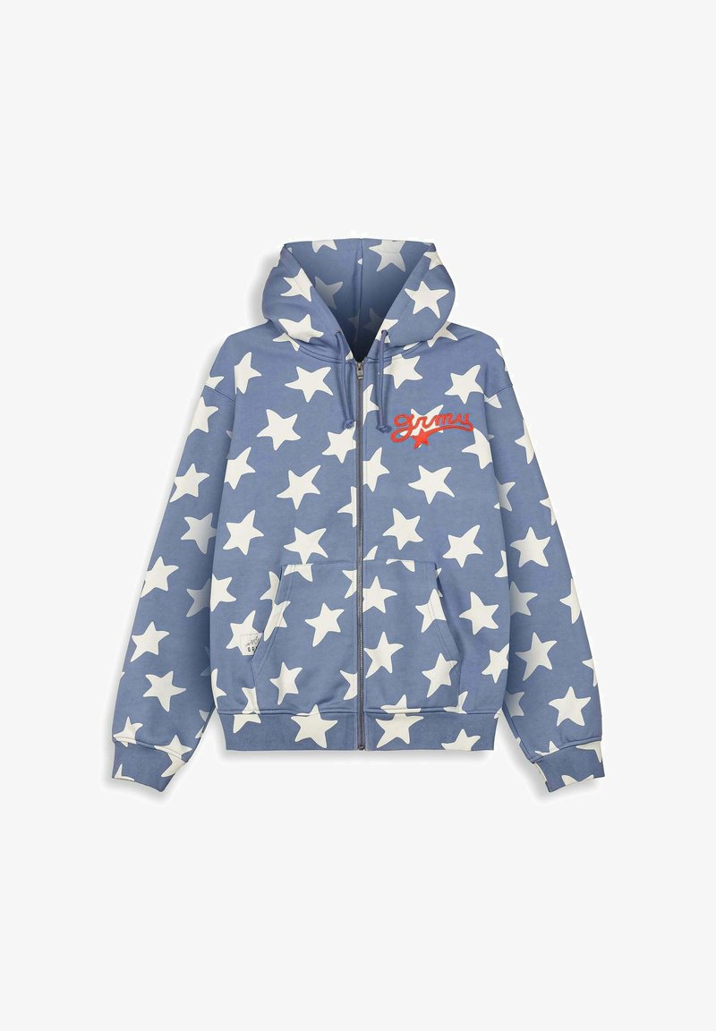 Blauwe zip-up hoodie met een wit sterrenpatroon, een grote voorkantzak en rode scripttekst. Gemaakt van zachte stof met ribgebreide manchetten.