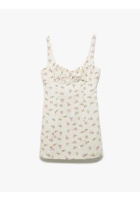 Bloemige tanktop in roomkleur met dunne bandjes, voorzien van een gerimpelde borst en kleine roze bloemenpatronen. Soepele textuur, aansluitend ontwerp.