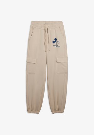 Joggers de algodón color beige con cintura elástica. Presentan bolsillos laterales y bolsillos estilo cargo. Decorados con un gráfico de Mickey Mouse en azul.