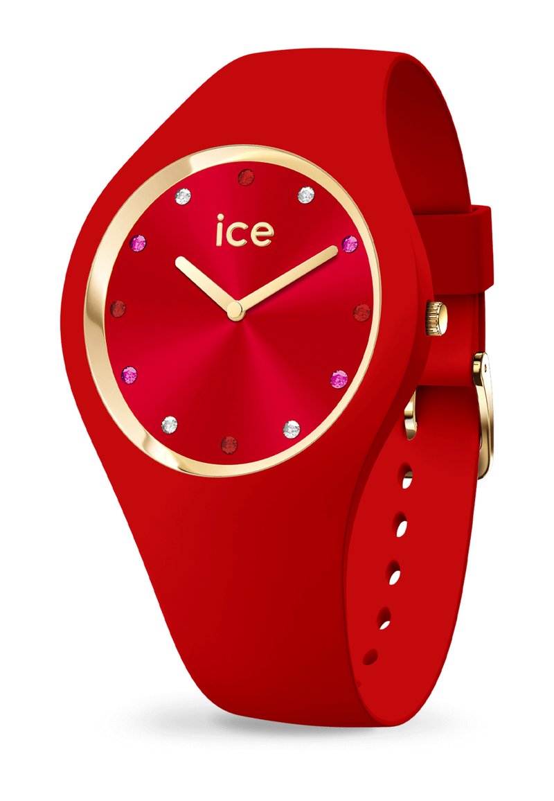 Orologio in silicone rosso con cassa tonda, accentuazioni dorate e indicatori delle ore in gemme multicolori. Presenta una texture liscia e un cinturino regolabile.