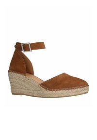 Braune Wildleder-Wedge-ESPADRILLES mit einem Knöchelriemen und einer geflochtenen Jutesohle. Verfügt über eine abgerundete Zehenpartie und genähte Details entlang des Randes.