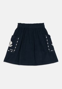 Navyblaue Cord-Rock mit elastischem Bund und bestickten Blumenpatch-Taschen auf jeder Seite.