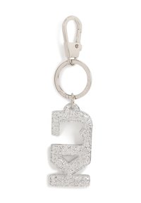 Porte-clés en argent pailleté avec un clip en métal et un charme pailleté en forme de lettre "G" abstraite.