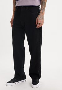 Levi's® Skateboarding SKATE BAGGY 5 POCKET - Vrećaste traperice - black grape