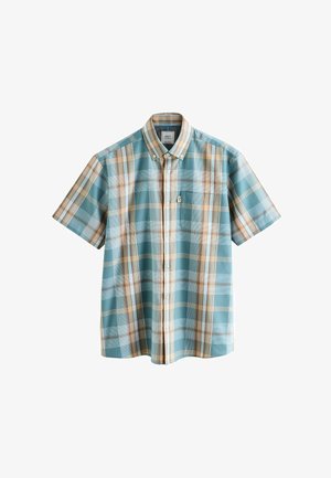 Camicia a maniche corte con bottoni, in un motivo a quadri blu e beige, dotata di colletto, taschino sul petto e con una texture liscia simile al cotone.