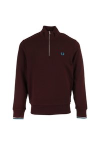 Burgundy zip-up sweatshirt in a soft fabric, featuring a ribbed hem and cuffs with blue and white stripe accents. Embroidered logo on chest.
