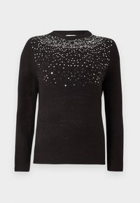 Maglione nero con maniche lunghe e scollo rotondo. Parte superiore decorata con un gradiente di paillettes nere e argento. Texture morbida.