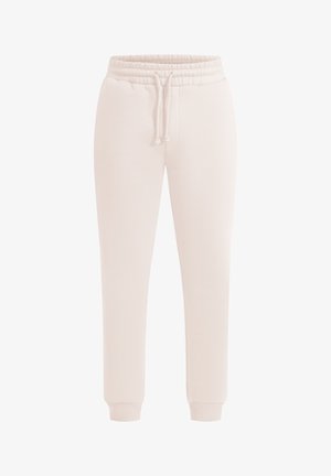 Pantalons de sport beige clair en tissu doux, avec une taille élastique, un cordon de serrage et des poignets fuselés. Texture lisse, sans motifs visibles.