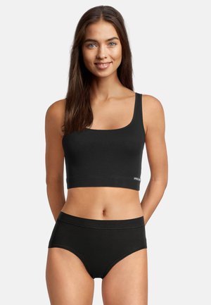 Schwarzer Baumwoll-Sport-BH mit breiten Trägern und kurzem Design, kombiniert mit hochgeschnittenen schwarzen Panties mit einem glatten Bund.