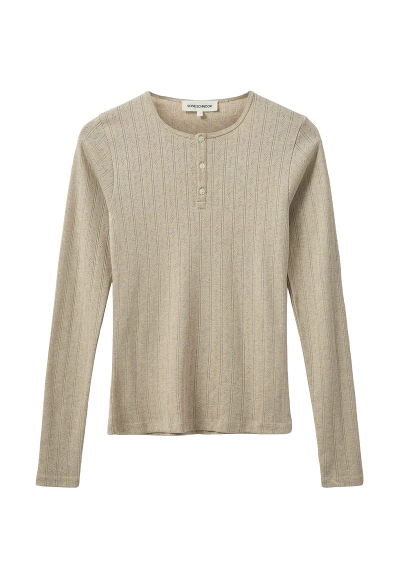 Világos bézs színű, hosszú ujjú felső, függőleges textúrált csíkokkal, kerek nyakkal és öt gombos üstökön elöl. Puha, kötött anyag.