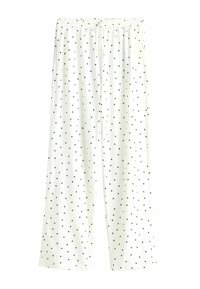 White loose-fit pants with black polka dots, elastic waistband, and drawstring front, displayed against a white background.