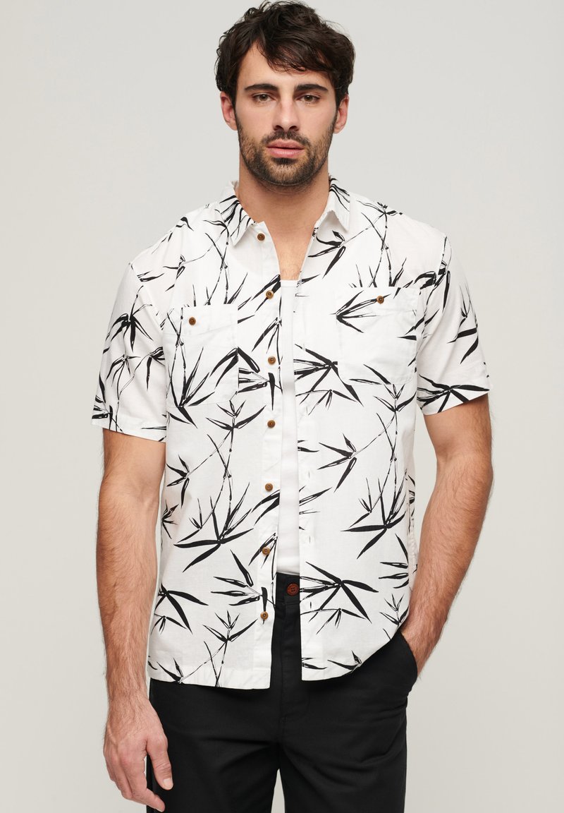 Superdry Short Chinois Combinaison Modèle Court Homme - Short Cargo Style Vintage