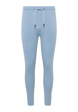 Lichtblauwe joggers gemaakt van zachte stof, met een elastische tailleband met trekkoord, zijkanten en taps toelopende benen.