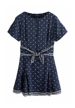 Navy blue dress made of fabric with white polka dots, short sleeves, button front, flared skirt, and a tied waist belt with patterned accents.