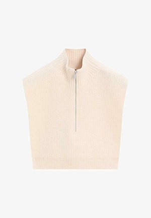 Ribbad, ljusbeige, kort stickad tröja med hög krage och silverfärgad dragkedja framtill. Ingen ärm, texturerad tyg.